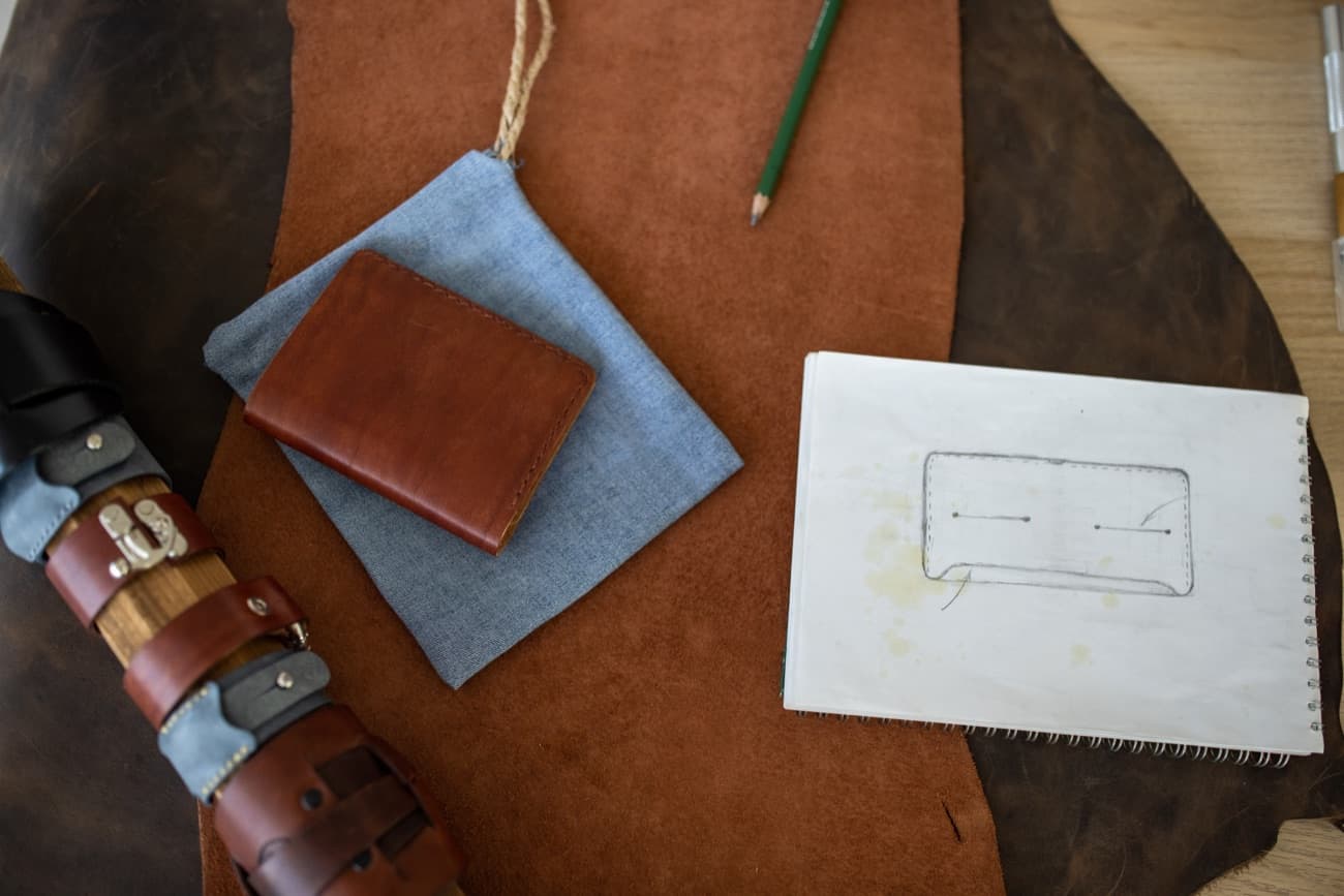 A hand-stitched leather passport holder