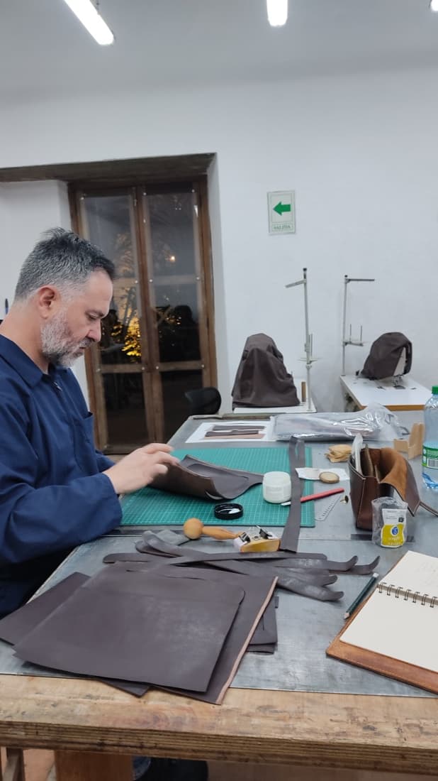Applying edge sealer to a leather piece