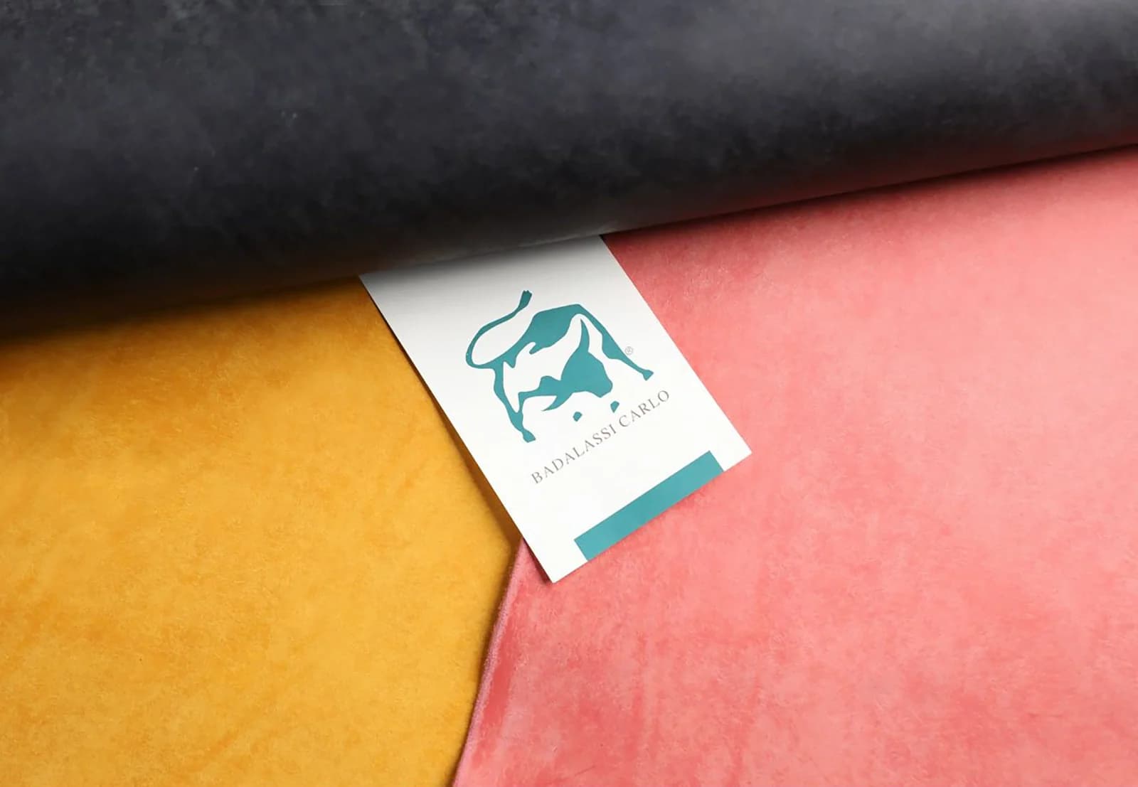 Natural, mustard, coral, and black leather panels