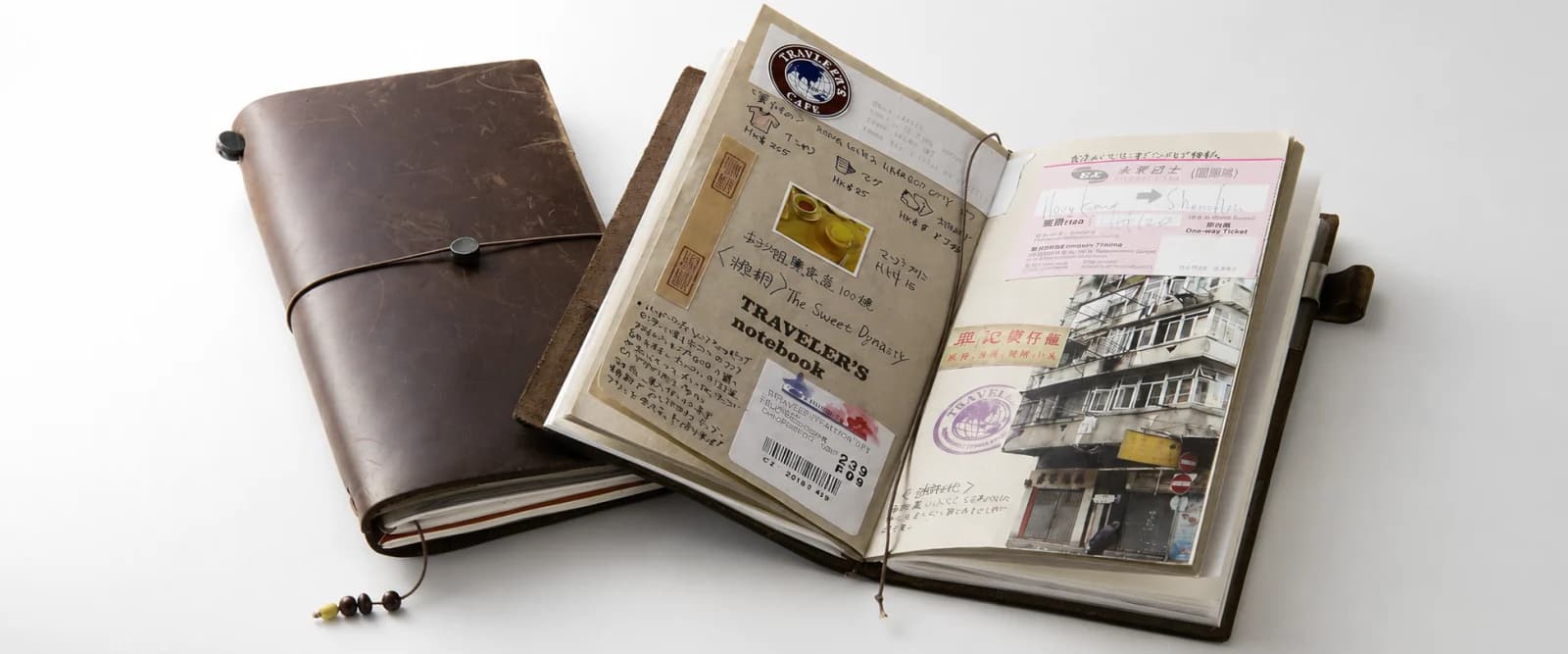 Handmade brown leather passport cover and notebook