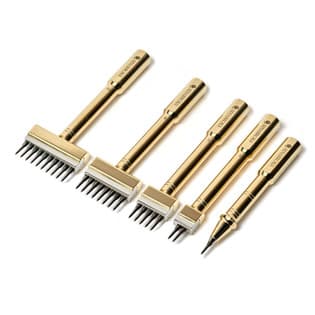 Selection of Sinabroks round-dent pricking irons with brass handles