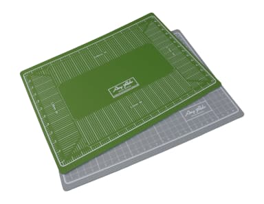 Green and gray Amy Roke double-sided cutting mat with printed guides